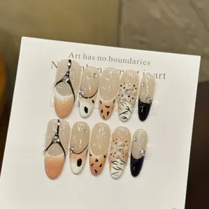 Handmade press-on nails with 3D floral leopard design and nude gradient finish