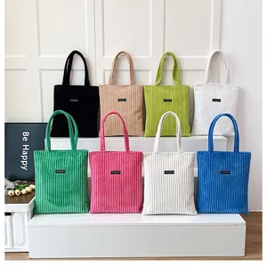 Borse tote in velluto a coste in vari colori con dettagli della trama del tessuto
