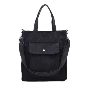 Japanese style black corduroy tote bag with adjustable shoulder strap and metal buckle pocket