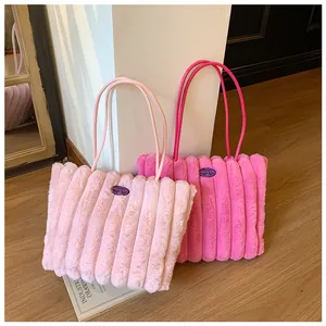 Vertical stripe plush tote bags in pink and magenta with soft faux fur texture