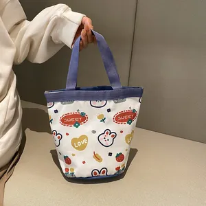 Cute canvas bucket bag with rabbit prints and purple handles for daily shopping