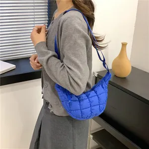 Stylish blue quilted cloud crossbody bag for women with adjustable strap and puff design
