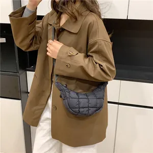 Quilted black half-moon crossbody bag for women with cloud pleat texture and nylon finish