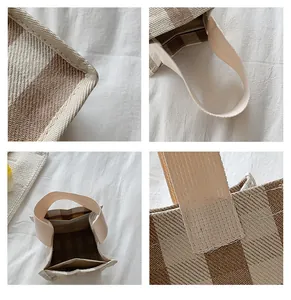 Détails du sac à main en tissu tissé avec motifs rayés et poignées renforcées