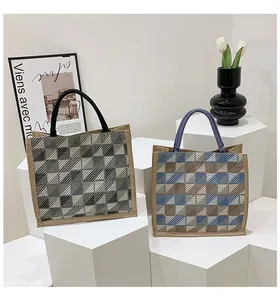 Detail of checkered canvas tote bag texture with minimalist artistic background