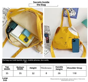 Size chart showing large cat canvas tote bag dimensions and spacious interior capacity