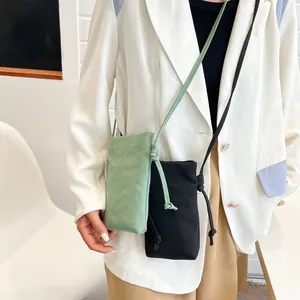 Mini canvas crossbody telefoontasjes in lichtgroen en zwart voor dames met schouderriem