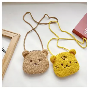 Detail of plush animal crossbody bags for kids featuring soft lamb wool texture and zipper