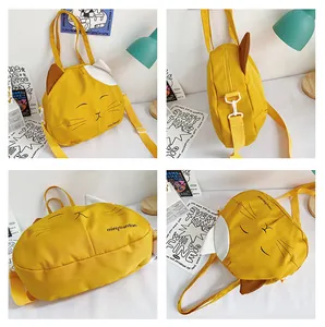 Detailed multi-angle views of a cute yellow cat canvas bag with adjustable strap