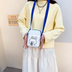 Lindo bolso bandolera de lona con estampado de conejo y correas azules