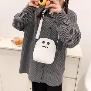 Minimalist white canvas crossbody bag with cute ghost pattern and adjustable strap