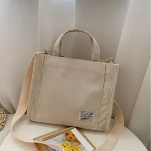 Borsa a mano in velluto a coste beige da donna con morbida trama e tracolla rimovibile