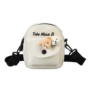 Cream canvas crossbody bag with cute teddy bear dolls and Tide Mian Zi embroidery