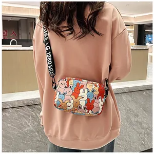 Detail of trendy cartoon rabbit crossbody bag with sporty G.1980 CITY NEW strap