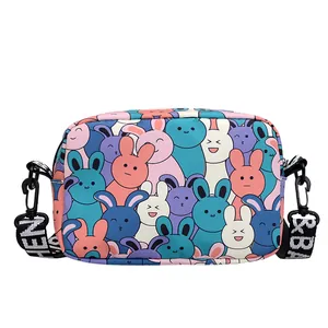 Fashionable cartoon bunny print crossbody bag with lettered strap and zipper closure