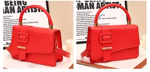 Detail van rode PU-leren handtas met vintage gesp en verstelbare schouderband
