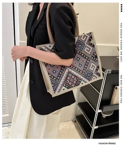 Close-up of ethnic tote bag with geometric woven patterns and thick rope handles