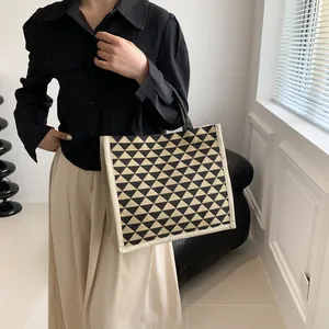 Japanese style jute tote bag with black and beige geometric patterns for daily commuting