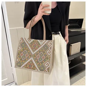 Detailed close-up of Bohemian geometric diamond patterns on large linen tote bag