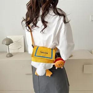 Cute yellow duck canvas crossbody bag with sailor collar and plush charm detail