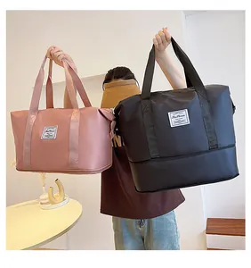 Pink and black large capacity waterproof travel bags shown with reinforced handles