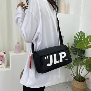 Black minimalist messenger bag with JLP logo and adjustable shoulder strap for casual wear