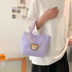 Mini lavender corduroy handbag with cute teddy bear embroidery and webbed handles