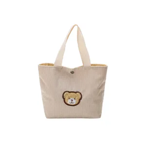 Mini beige corduroy handbag with cute teddy bear embroidery and top metal snap button