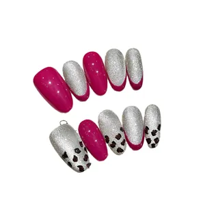 Pink leopard press-on nails with silver glitter and gloss finish for women