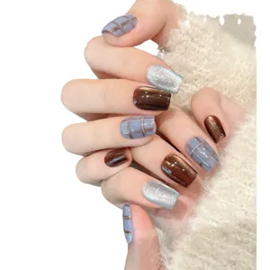 Blue plaid and brown cat-eye press-on nails with silver glitter finish for autumn