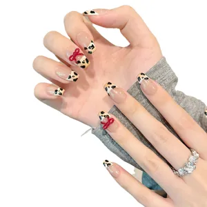 Französische Leopard-Print Nägel zum Aufdrücken mit roten 3D-Schleifen Design