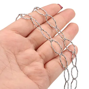 Silver textured stainless steel diamond cross chain necklace with large oval links