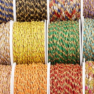 Colorful enamel link chains on spools for DIY jewelry making with vacuum gold plating