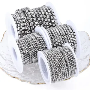 Polished stainless steel pearl chains on white spools for DIY jewelry making