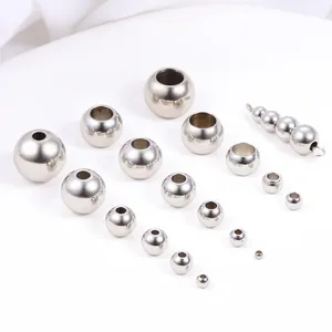 Cuentas pulidas de acero inoxidable en varios tamaños para creación de joyas DIY