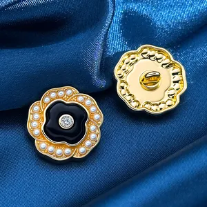 Elegant gold flower button with black enamel, white pearls and center zircon stone