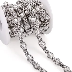 DIY handmade stainless steel chain with white pearls on a spool for jewelry making