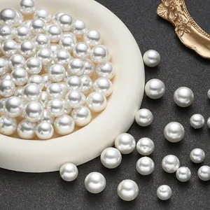 Glossy white round ABS pearl beads with holes for DIY jewelry making and crafts