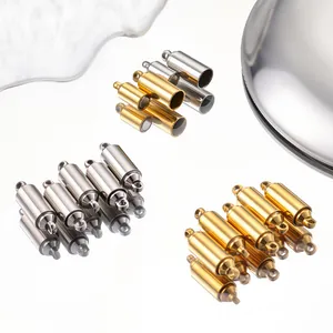 Macro shot of stainless steel cylindrical magnetic clasps in gold and silver finish