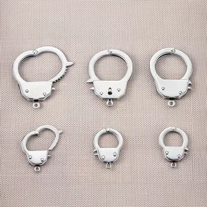 Detailed macro view of 304 stainless steel handcuff-shaped jewelry connector charms
