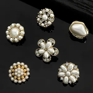 Detail of luxury gold pearl buttons with rhinestones for coats and cashmere jackets