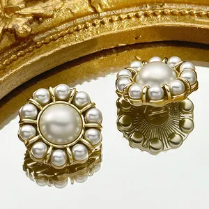 Luxurious gold flower buttons with pearl clusters and sparkling crystal accents
