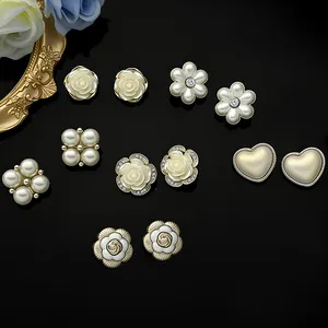 Elegant gold flower and pearl stud earrings set featuring heart and star floral designs