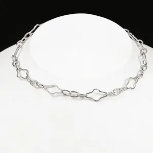 Polished stainless steel necklace featuring hollow clover and oval link chain design