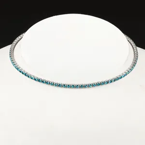 Blue rhinestone tennis necklace with silver chain on a professional neck display model