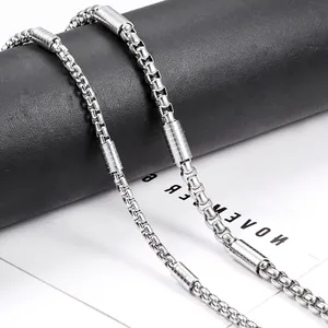 Polished stainless steel square bead necklace with ribbed cylindrical metal spacers