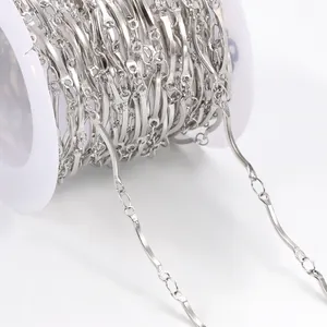 Silver stainless steel curved bar DIY jewelry chain wound on a white spool roll
