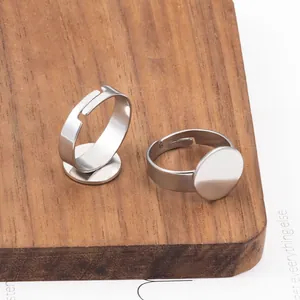 Verstellbare 12mm Edelstahl Ringrohlinge mit flacher Platte für DIY Schmuckherstellung
