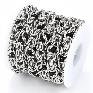 Chaîne DIY en acier inoxydable avec perles noires sur une bobine en plastique blanc
