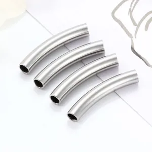 Set of four curved stainless steel tube beads with a brushed gold finish for DIY jewelry